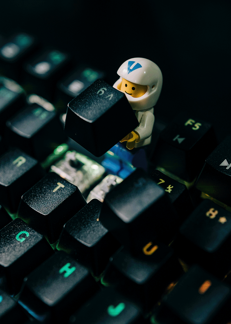 lego man on a computer keyboard